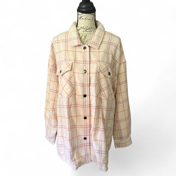 Front of Plaid jacket on a mannequin against a white background