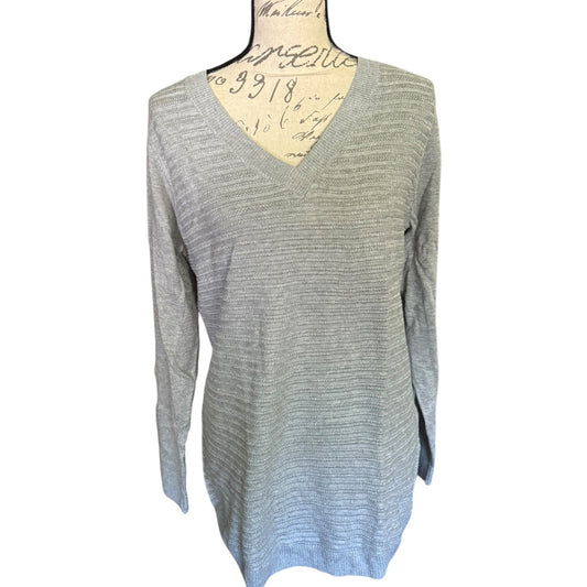 Front of Gray sweater on a mannequin with a white background