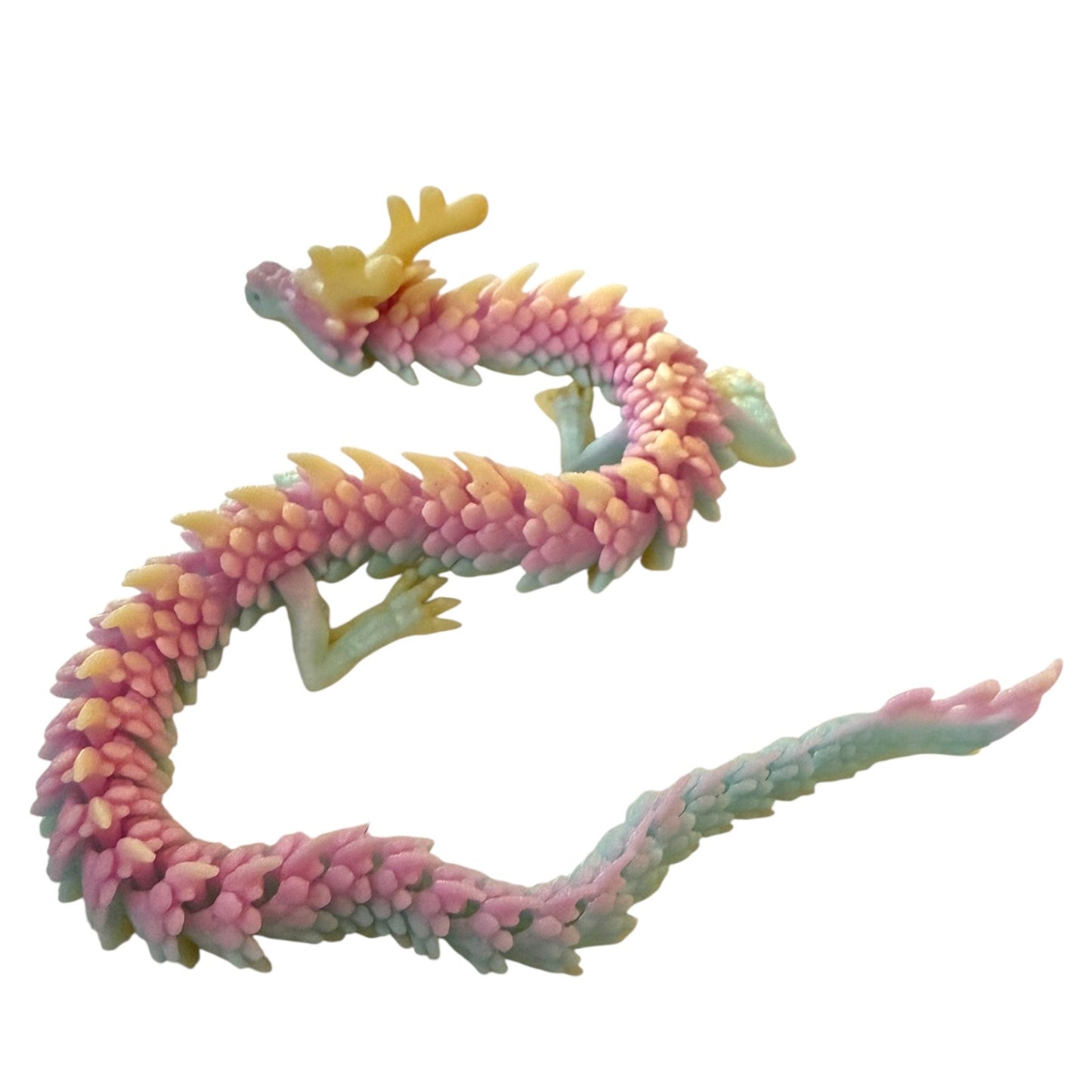 Colorful dragon-shaped toy on a white background