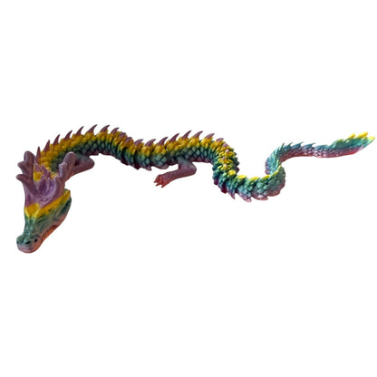 Colorful dragon toy figure on a white background