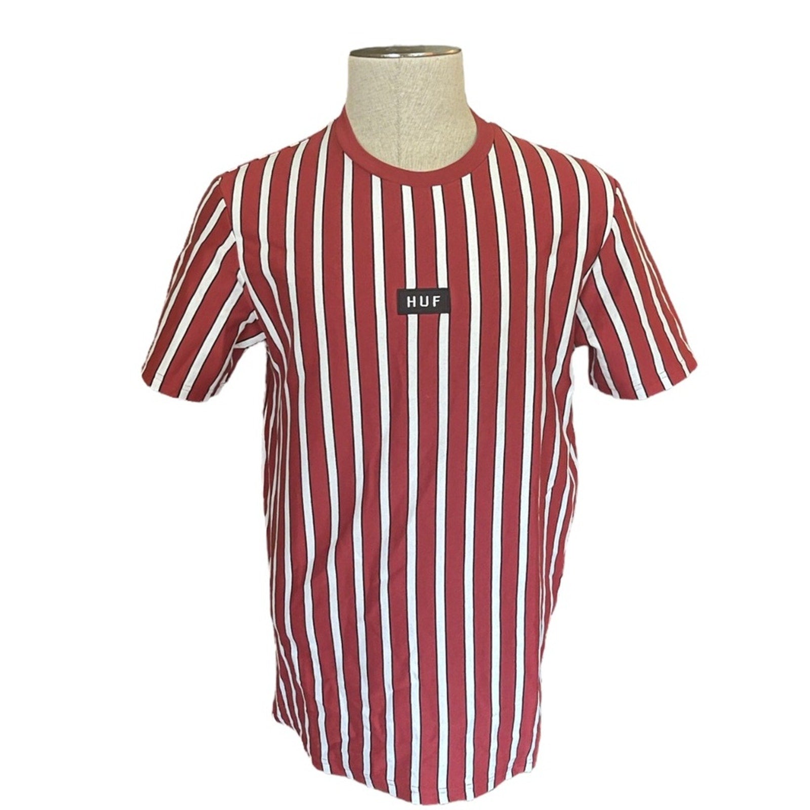 Front of Red and white striped t-shirt on a mannequin with HUF logo.