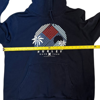 Navy blue hoodie with graphic design and Hurley logo, measured with a yellow tape measure.