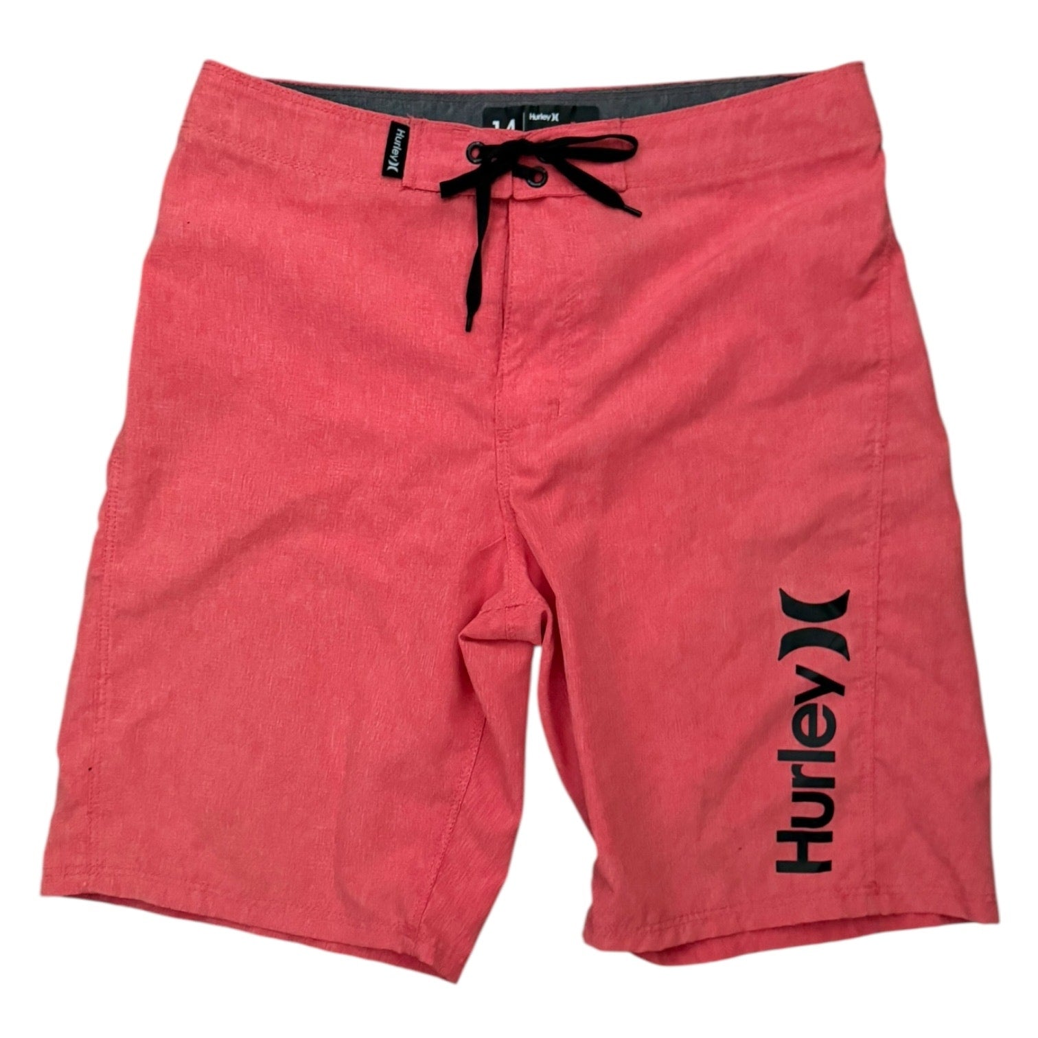Red Hurley shorts on a white background