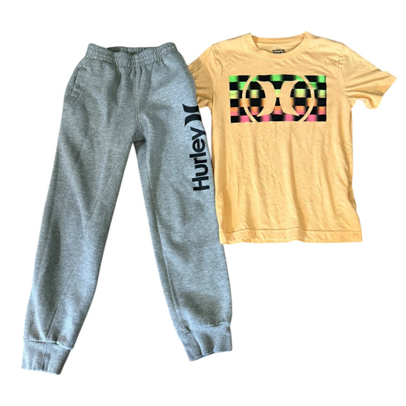 Gray pants with orange shirt front