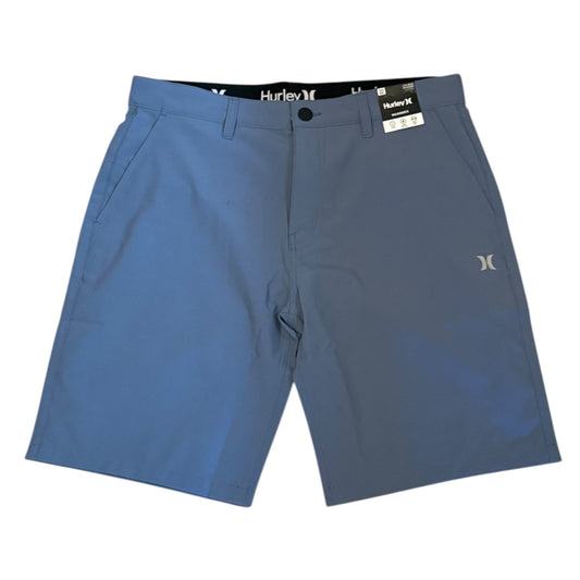 Front of Blue shorts with a Hurley label on a white background