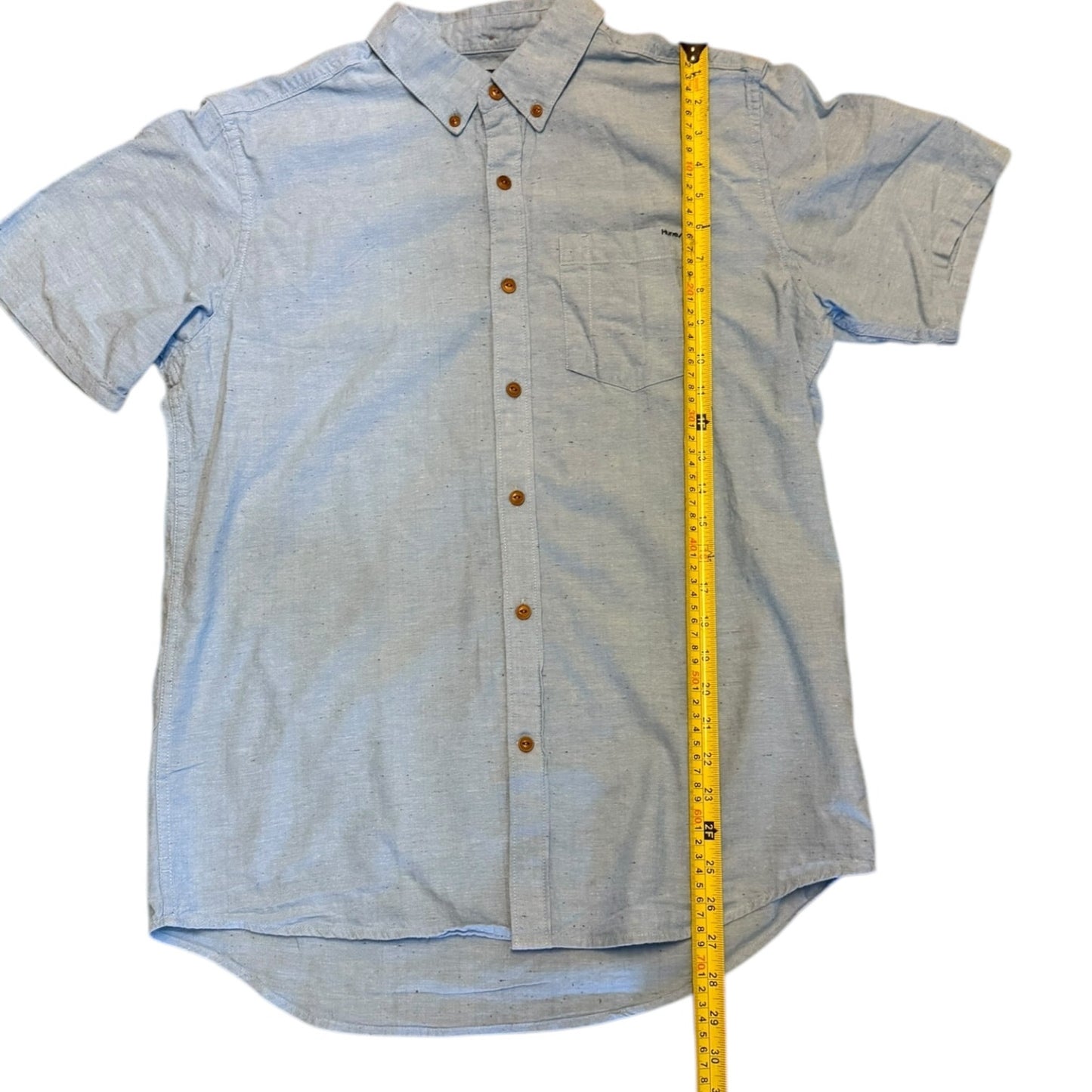 Short-sleeve button-up shirt with a measuring tape for size reference on a white background