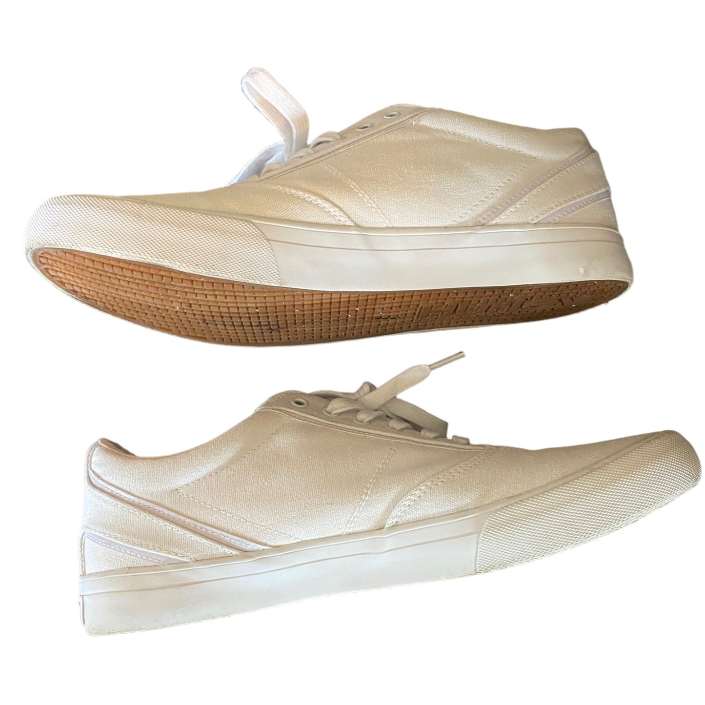 Side of white sneakers on a white background