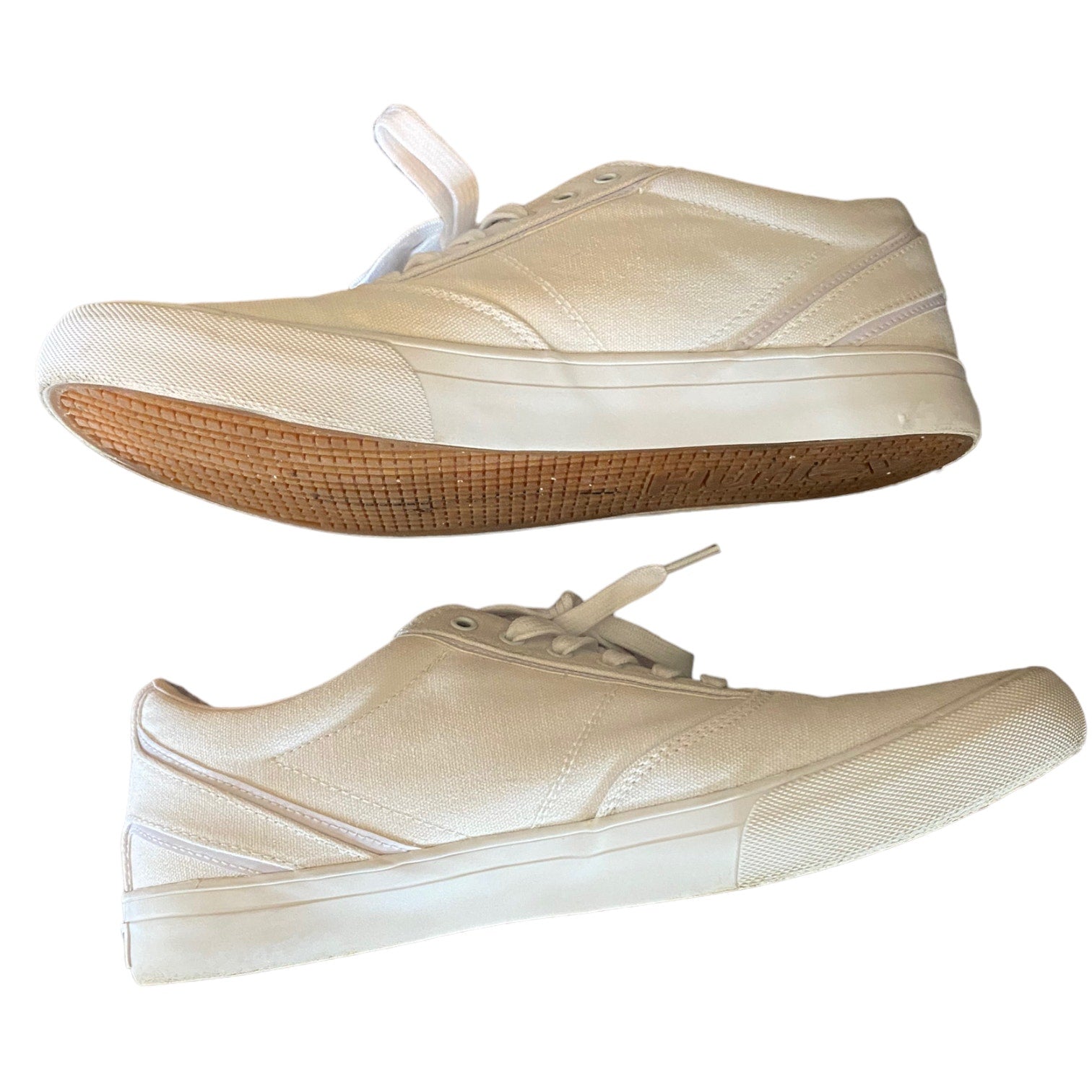 Side of white sneakers on a white background