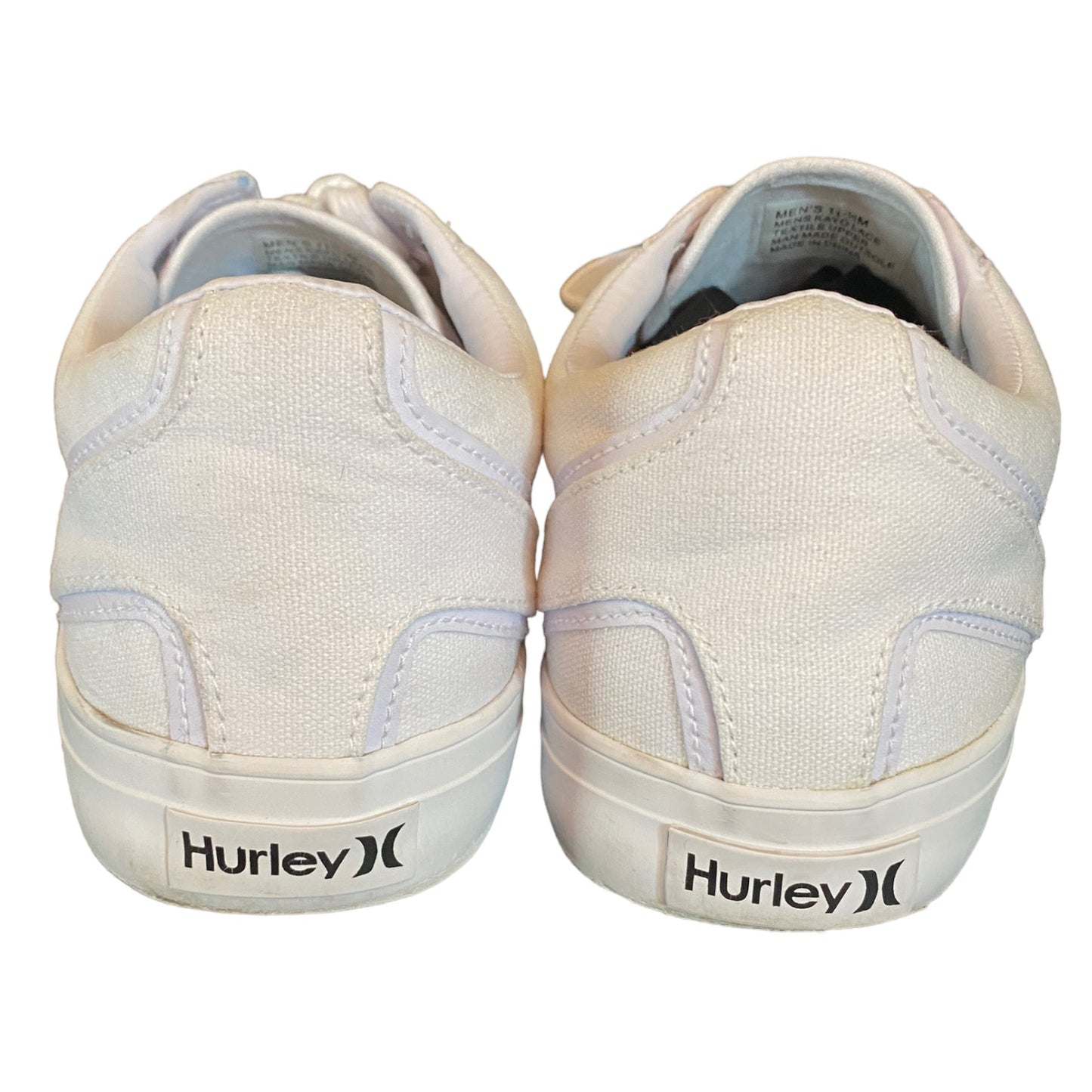 Back of White sneakers with 'Hurley' branding on a white background