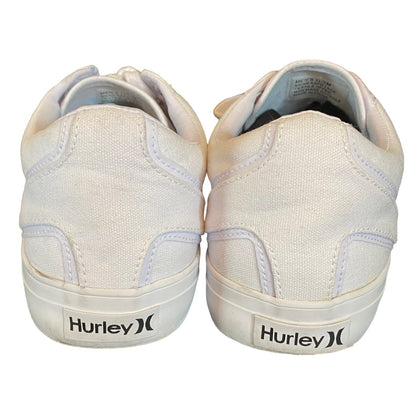 Back of White sneakers with 'Hurley' branding on a white background