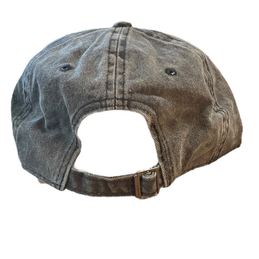 Washed denim cap with strap on a white background