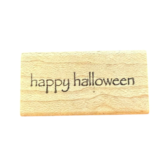 Wooden stamp with 'happy halloween' text on a white background