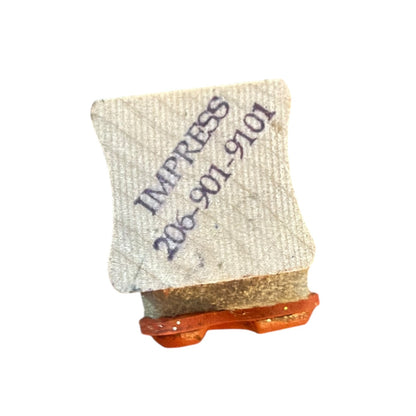 A small square rubber stamp with dark printed text reading 'IMPRESS 206-901-9101', shown on a plain white background.