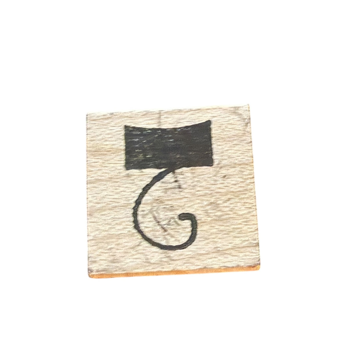 A square wooden stamp with a hook or the number 2 and a light beige wood grain background.