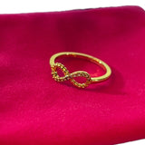 Gold CZ ring with pink storage bag