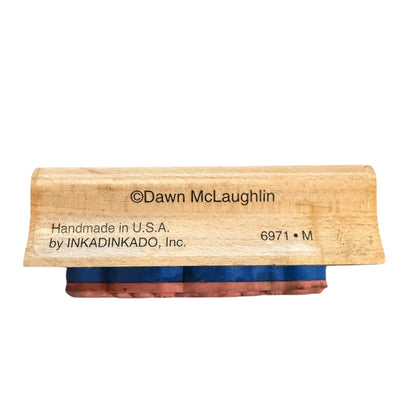 Wooden stamp with writing on the side on a white background