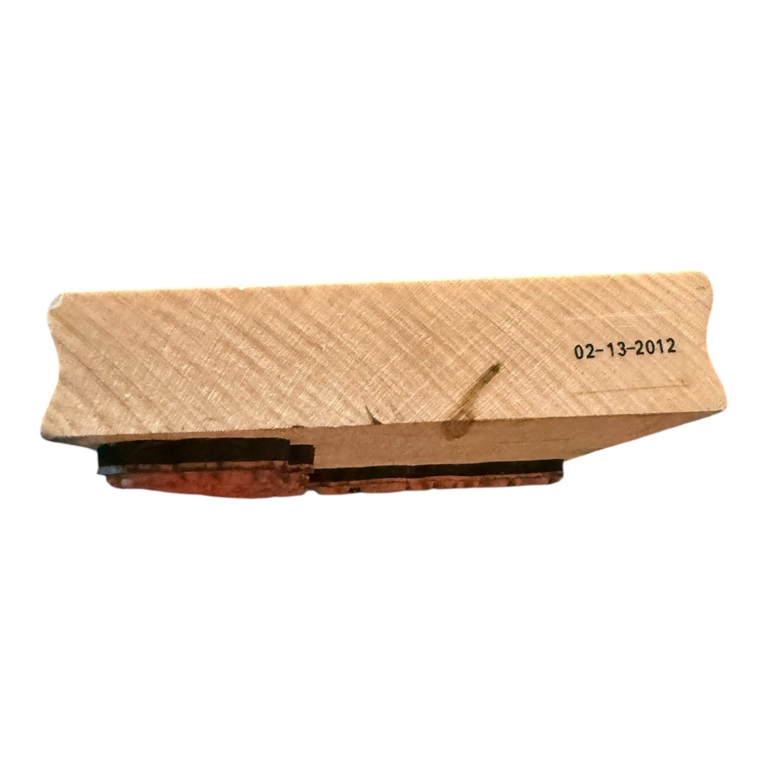Wood Block with a date stamp on a white background