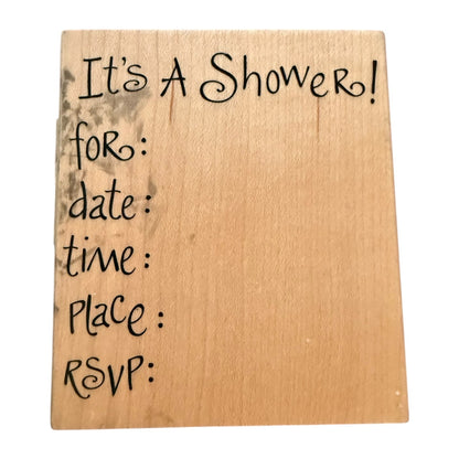 Wooden sign with handwritten text for a shower invitation on a white background