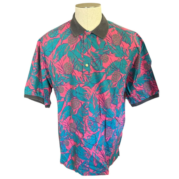 Colorful patterned shirt on a mannequin against a white background