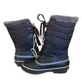 Side view of black tall boots on white background