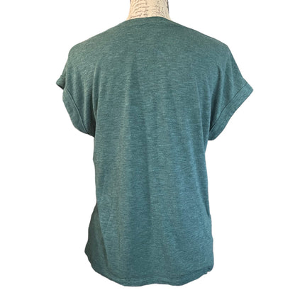 back of a green shirt with short sleeves on a white background