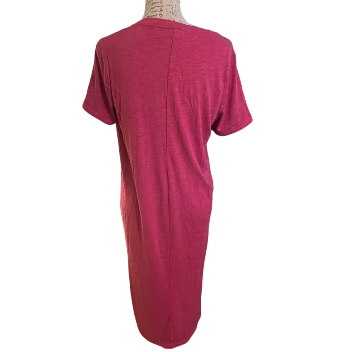 A short-sleeve t-shirt dress in a heathered red, displayed on a mannequin from the back against a plain white background.