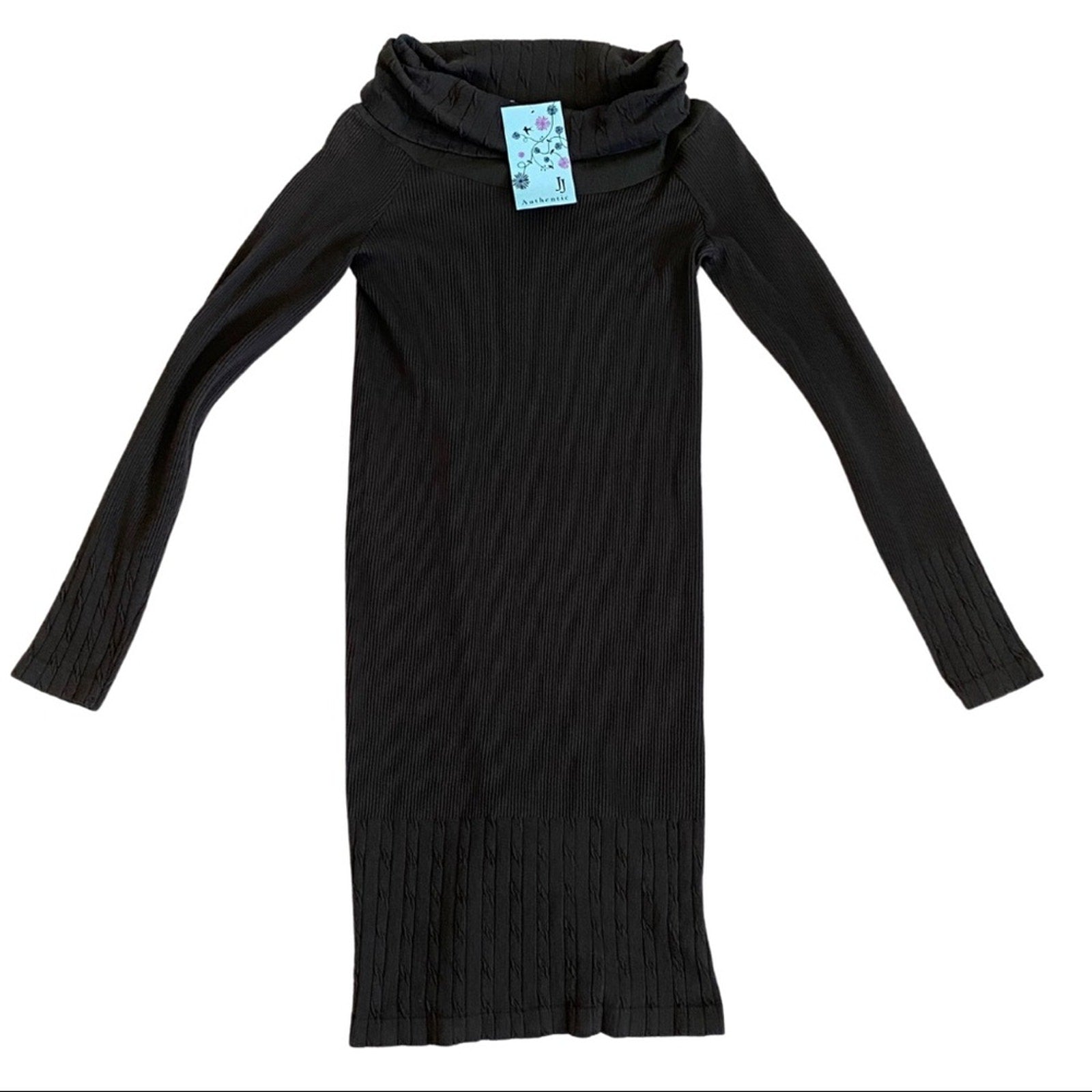 Dark green ribbed dress with a tag on a white background