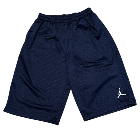 Front of Navy blue shorts with a logo on a white background