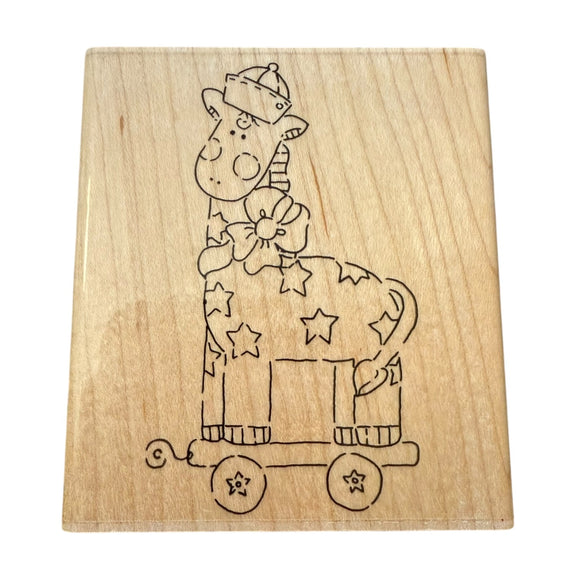 Wooden stamp with a giraffe design on a white background