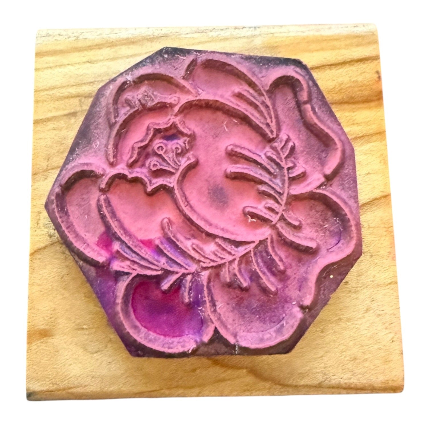 Flower rubber stamp on a wooden block