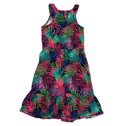 Back of Colorful tropical leaf patterned dress on a white background
