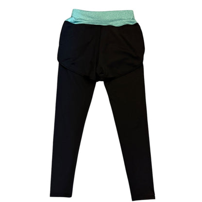 Back of Black leggings with a green waistband on a white background
