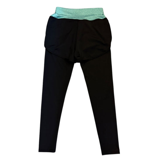 Back of Black leggings with a green waistband on a white background