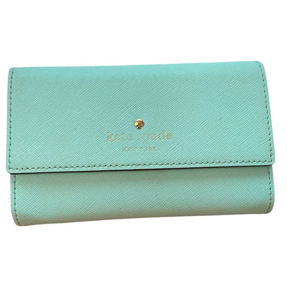 Baby blue wallet with gold logo on a white background
