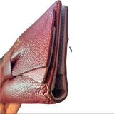 Close-up of a leather wallet edges on a white background