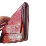 Close-up of a leather wallet edges on a white background