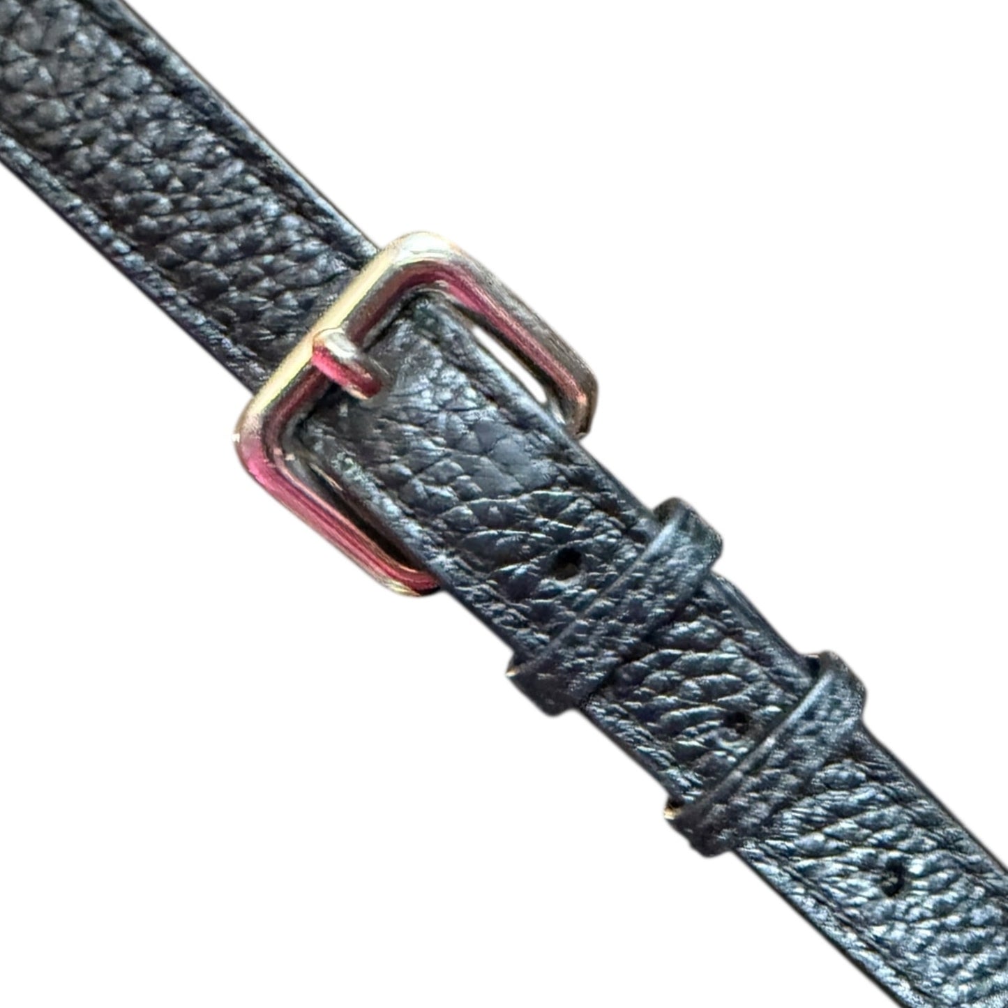 Black leather strap with a silver buckle on a white background
