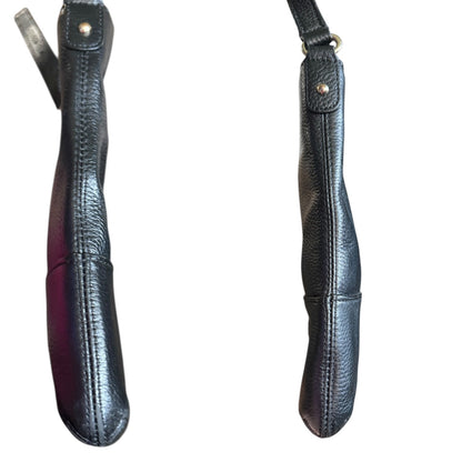 Sides of black leather bag on a white background