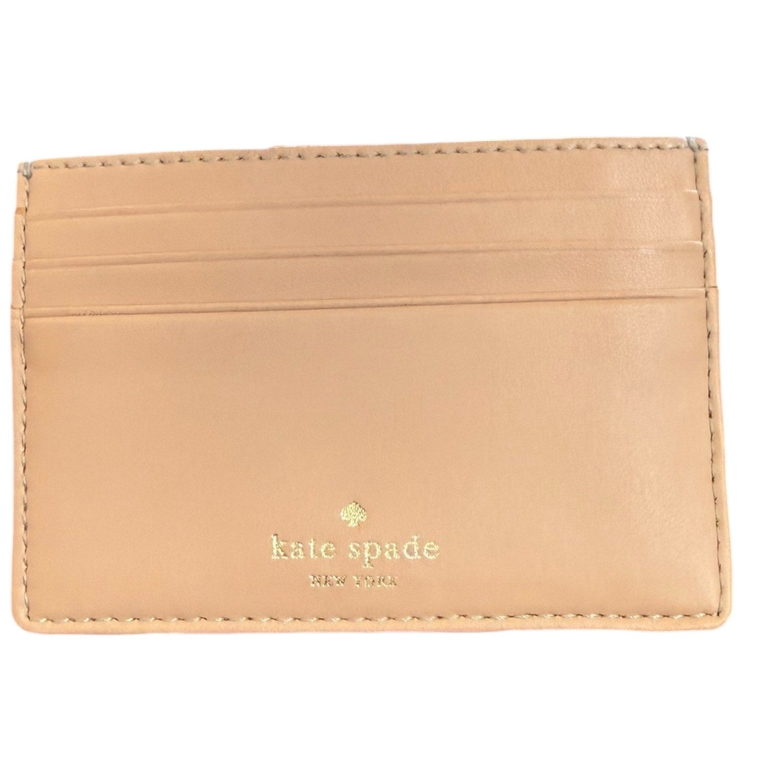 Cardholder with 'kate spade' logo on a white background