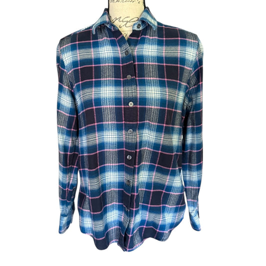 A long-sleeve button-up plaid flannel shirt displayed on a dress form mannequin against a plain white background.
