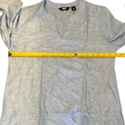 Blue shirt with a measuring tape on a white background