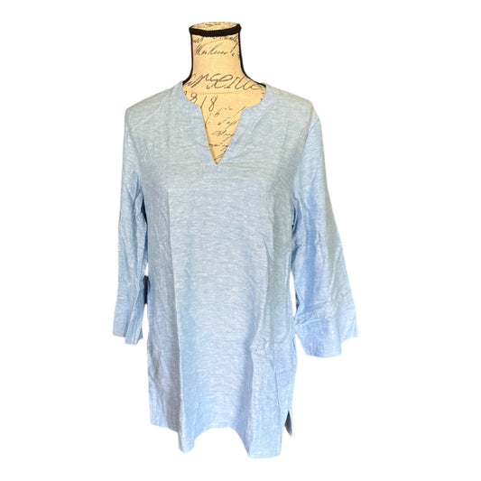 Light blue tunic shirt on a mannequin against a white background