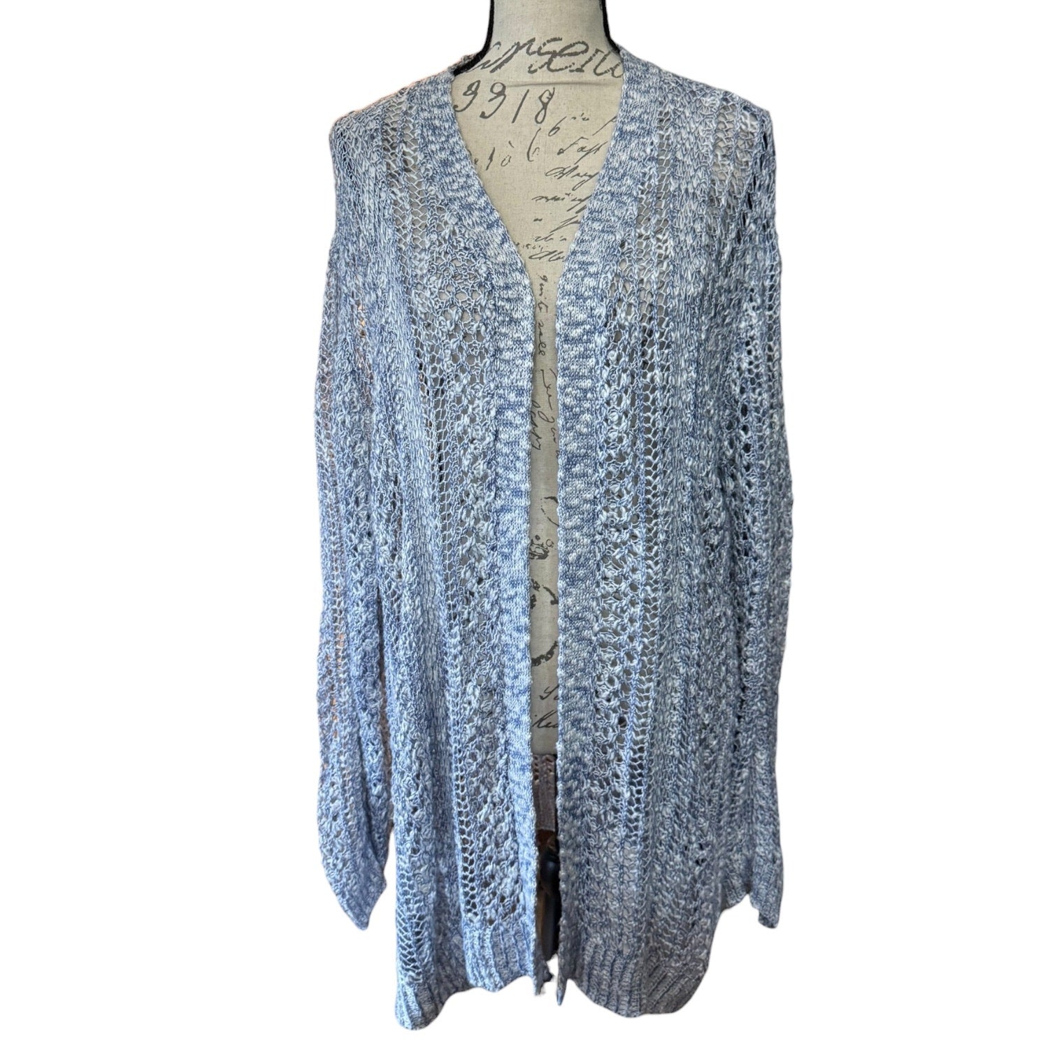 Front of Blue knitted cardigan on a mannequin against a white background