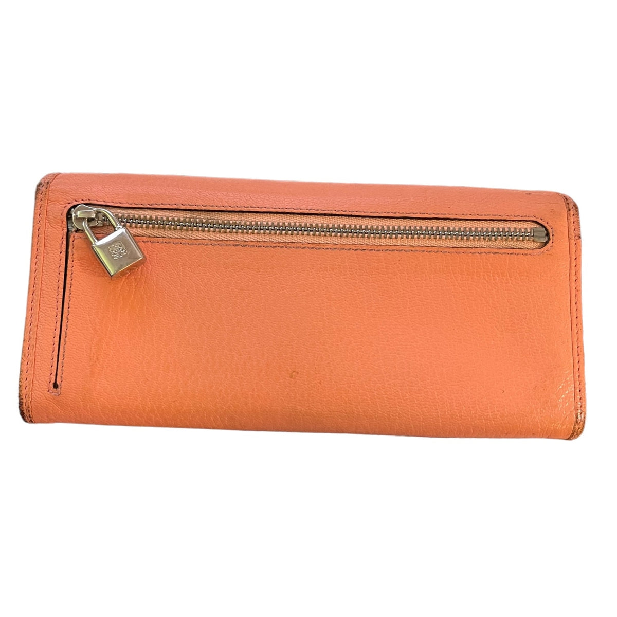 An orange pebbled leather wallet with a silver zipper and a small metal padlock, shown on a plain white background.