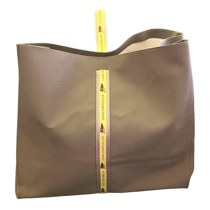 Back of grayish green tote bag with a yellow design on a white background