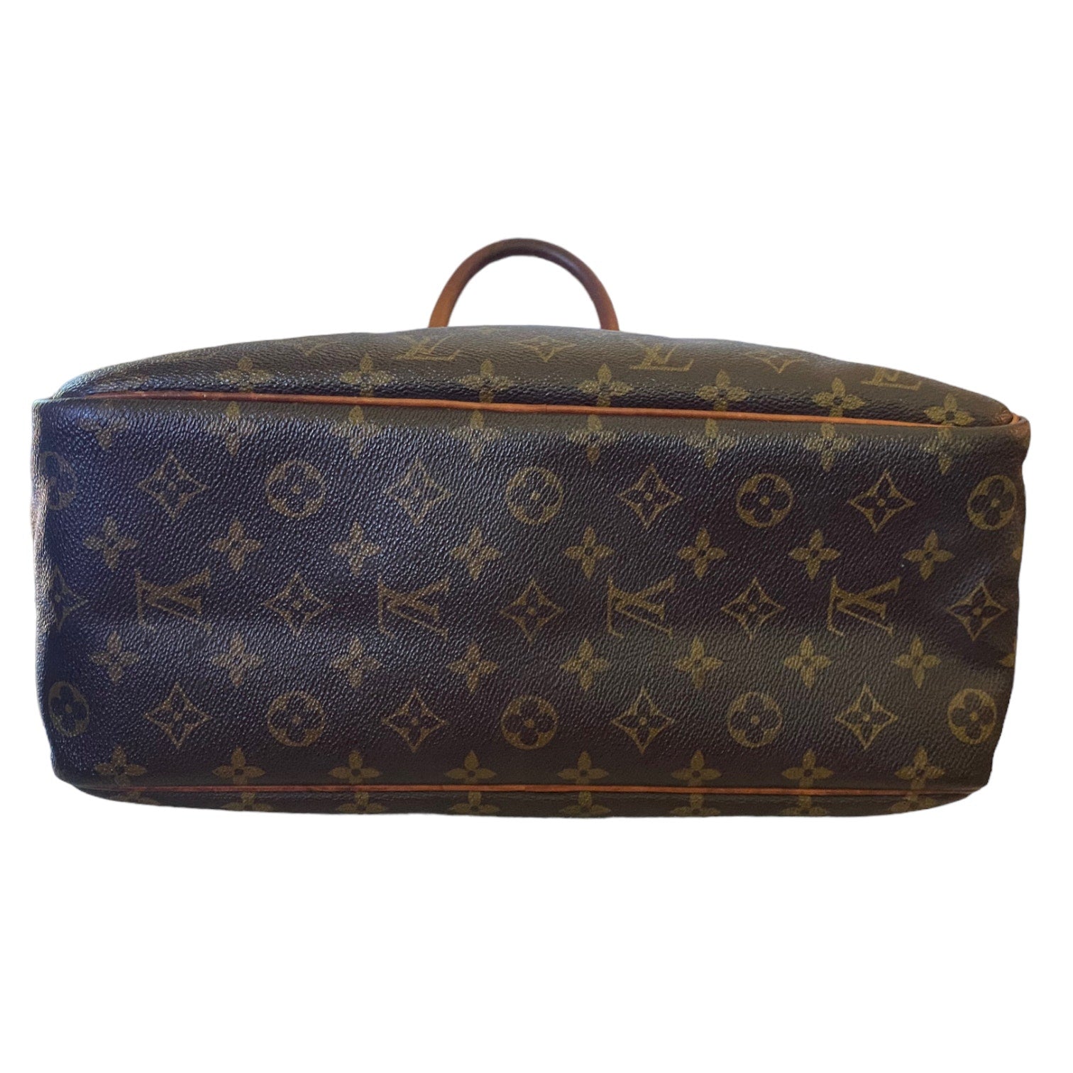 Bottom of Louis Vuitton monogram patterned suitcase on a white background
