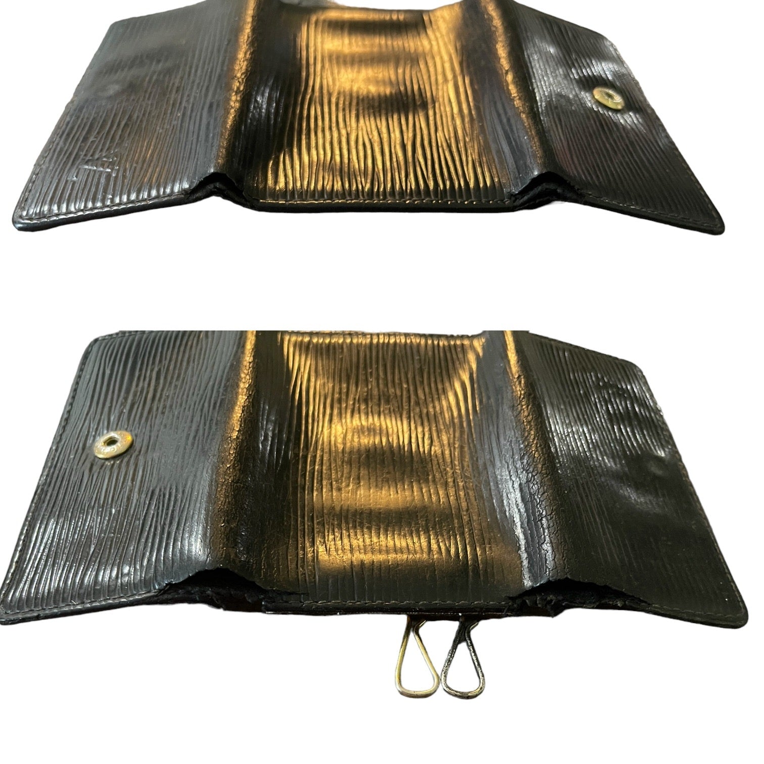 Black key chain laid out with issues shown