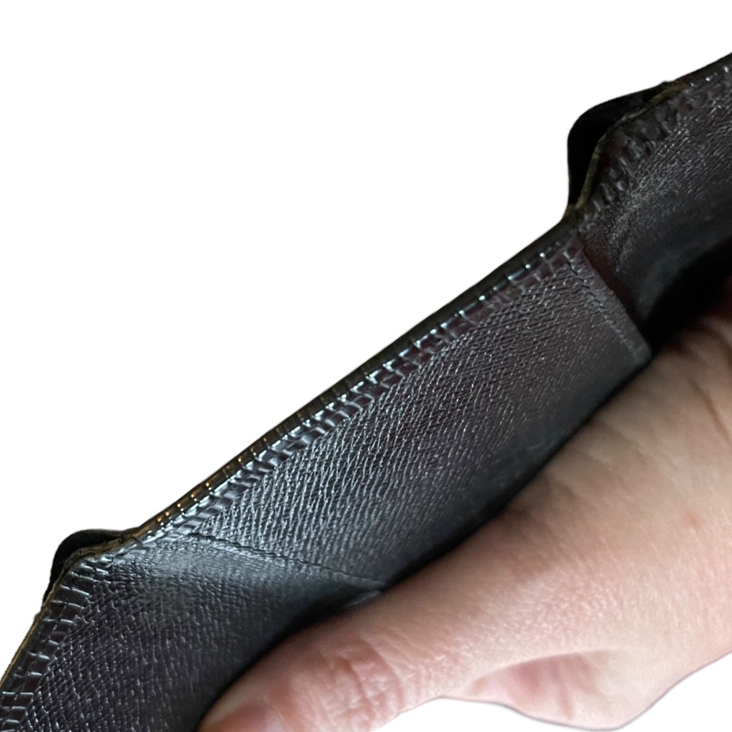 Side of black key chain with issues