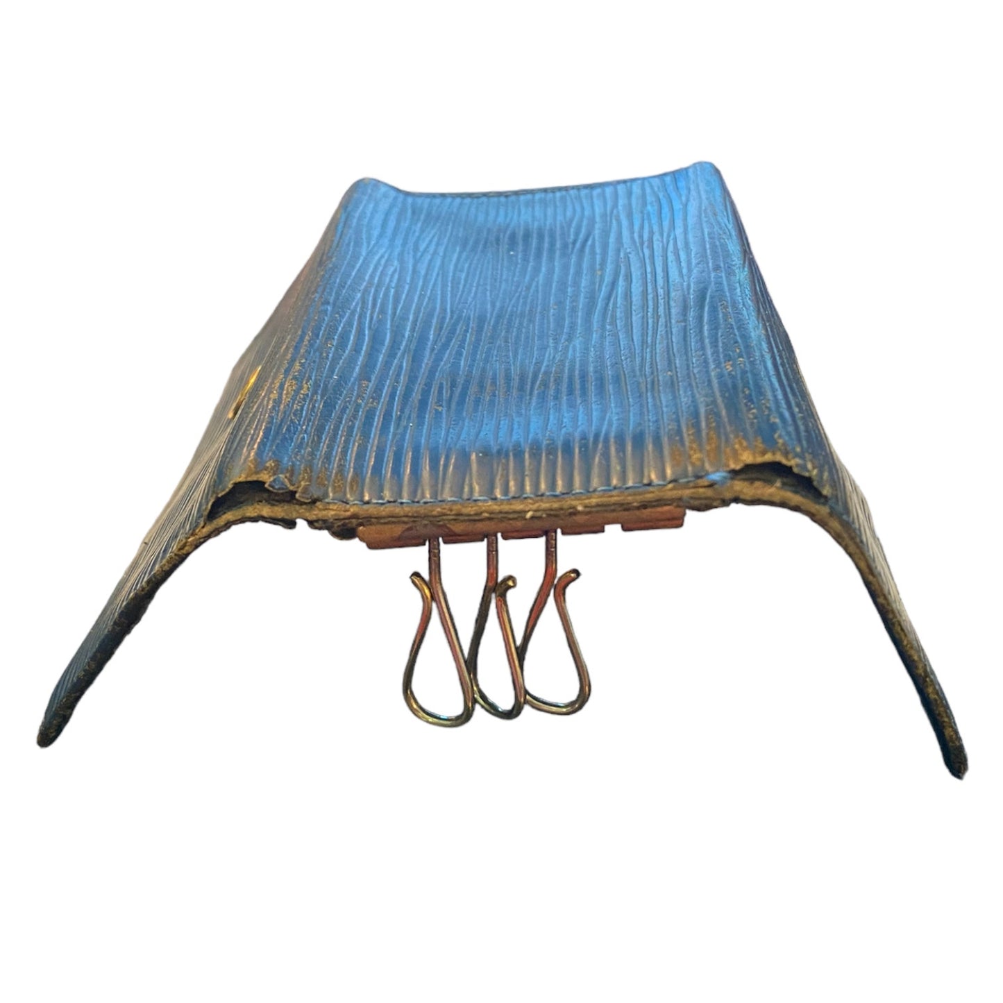 Side view of Louis Vuitton keychain showing issues metal base on a white background