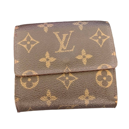 A brown Louis Vuitton monogram wallet with a classic tan monogram pattern, shown against a plain white background.